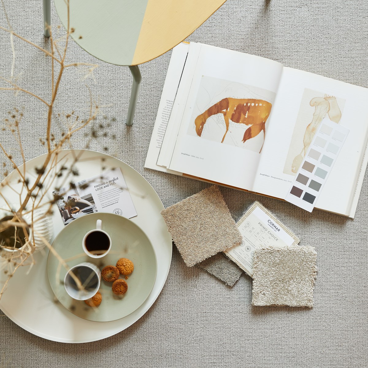 Plate of food and drink on Boucle Neutrals In Portobello Silver Carpet